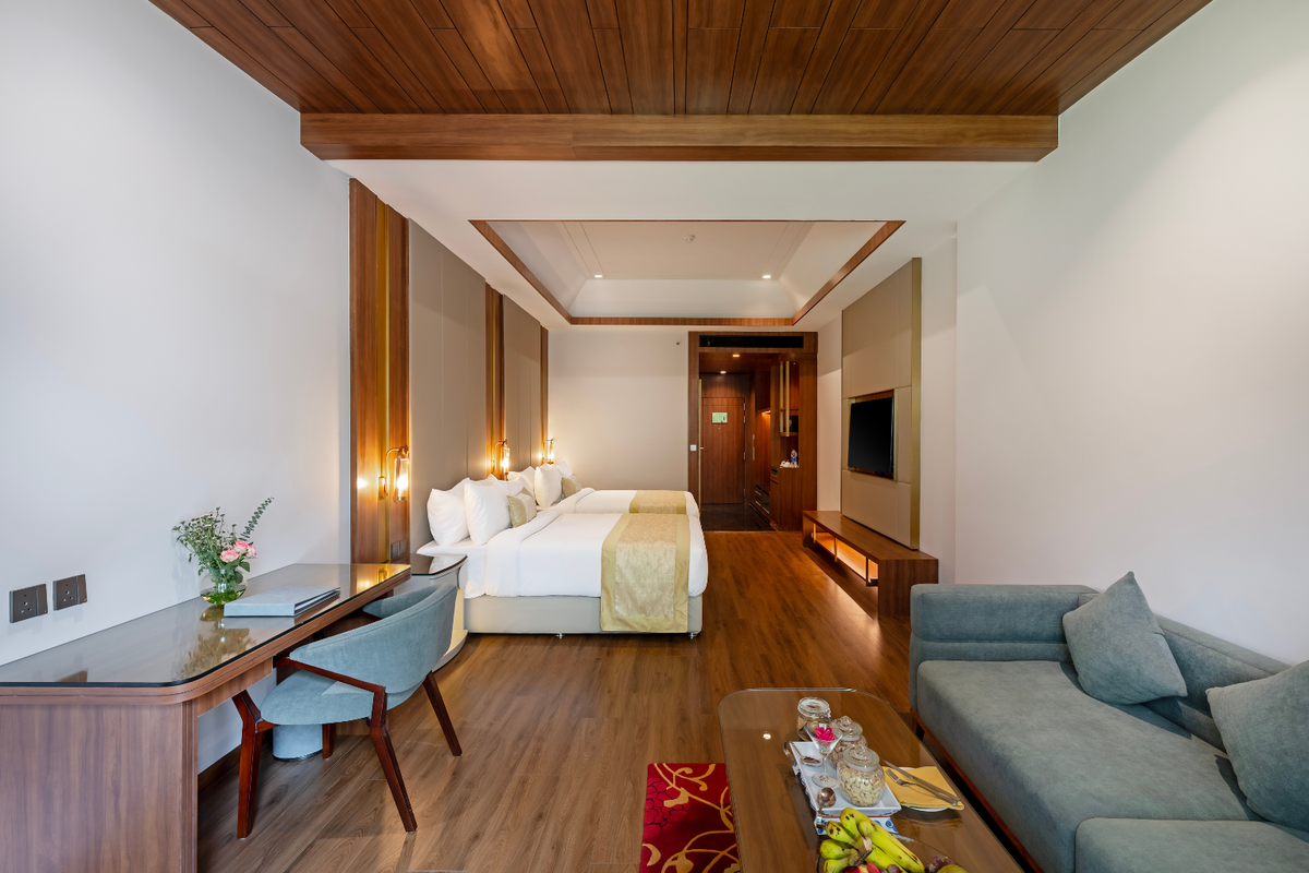 Quad Room sitting area at City Park Green Resort, New Delhi